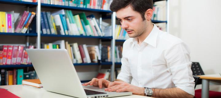 Male student on laptop