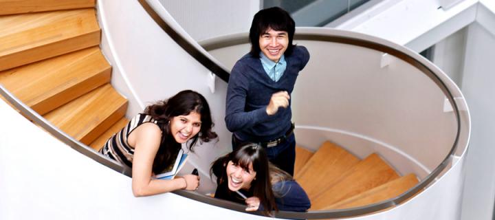 Students on spiral staircase photograph